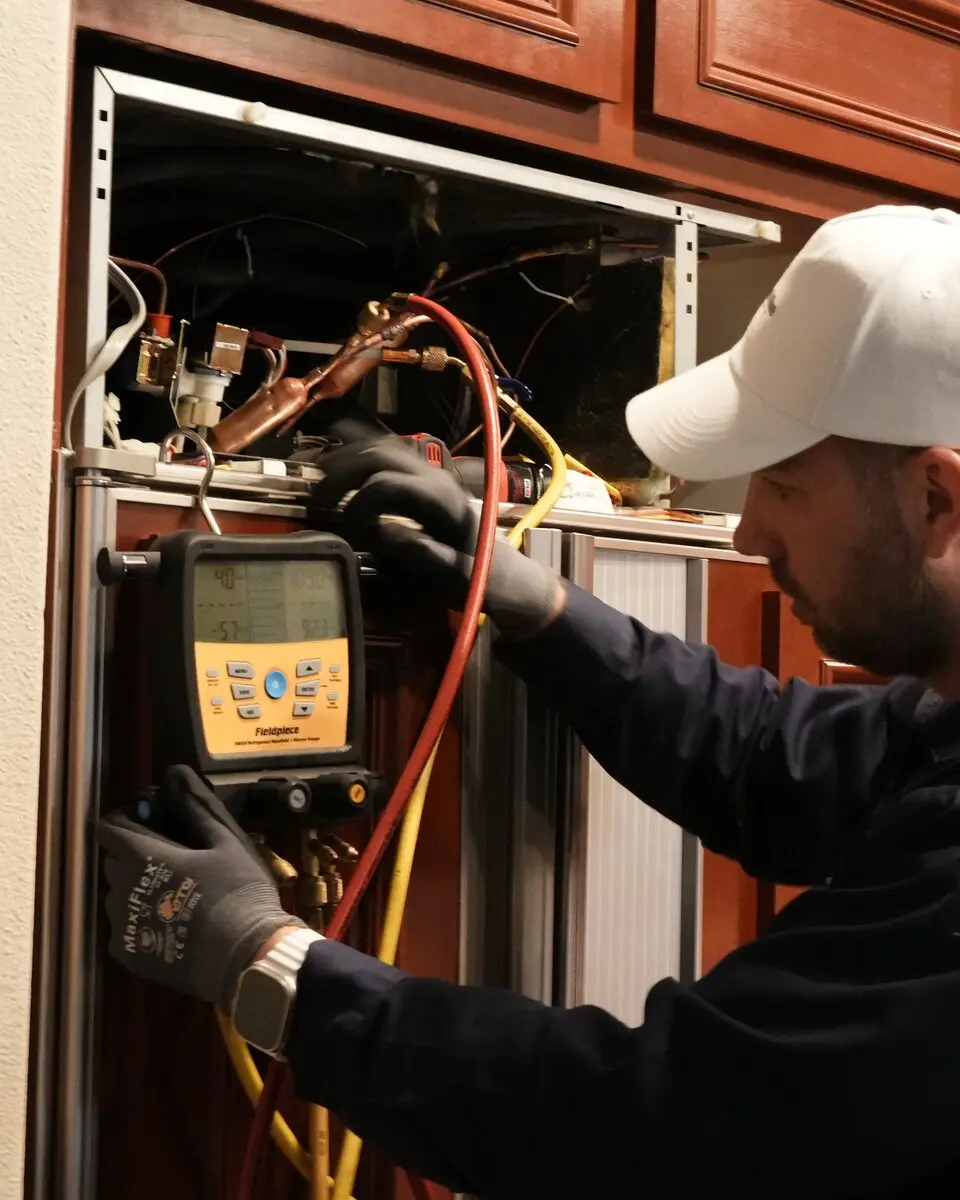 Senior tech on a Sub-Zero refrigeration repair
